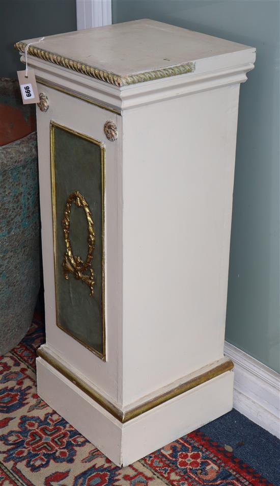 A pair of painted parcel gilt pedestals Height 88cm